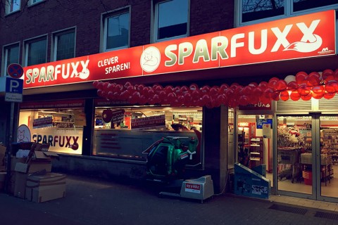 Ladenbeschriftung und Leuchtreklame für SPARFUXX